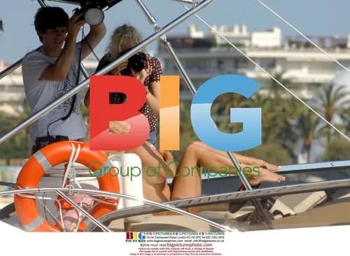 Pamela Anderson on Yacht in Cannes