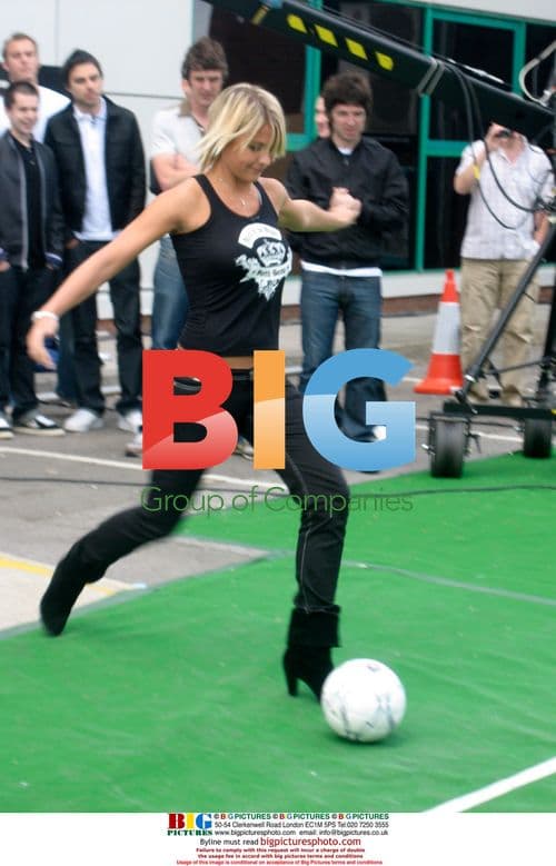 Gemma Atkinson kicks ball on Soccer AM