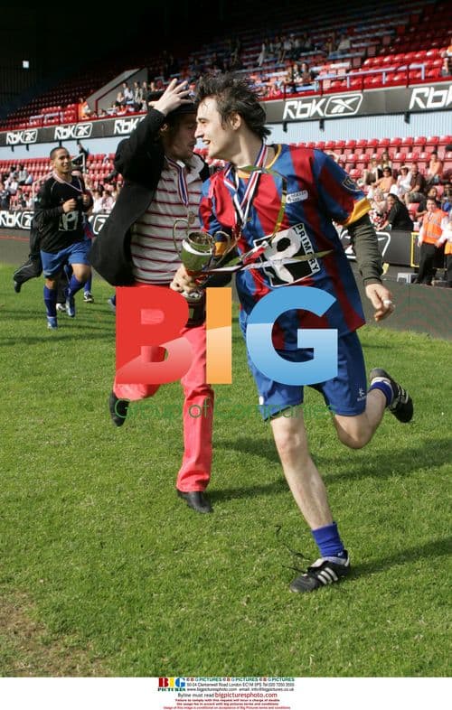 Babyshambles Team Celebrates Soccer Tournament Win