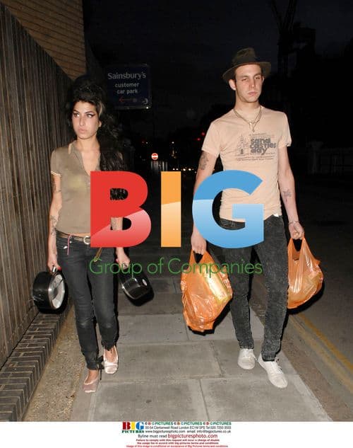 Amy Winehouse and Alex Fielder-Civil Out Shopping in Camden