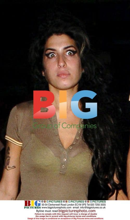 Amy Winehouse and Alex Fielder-Civil shopping