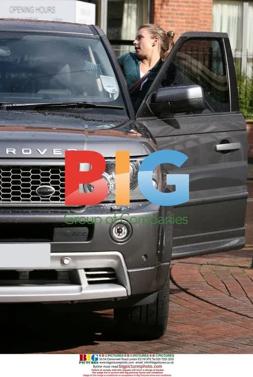 Wayne Rooney and Coleen Mcloughlin Return to Car