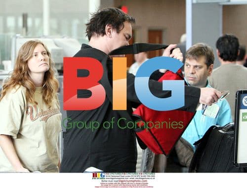 Quentin Tarantino Passing Through Airport Security