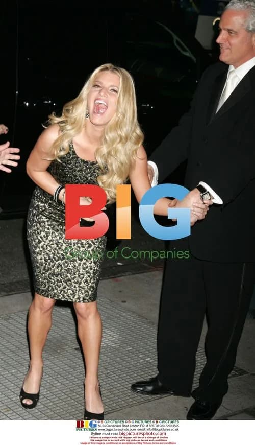 Jessica Simpson laughs after tripping