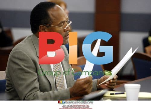 O.J. Simpson Reviews Notes in Court During Arraignment