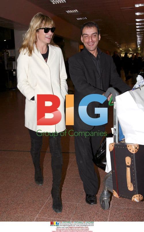 Kate Moss Arrives at Heathrow