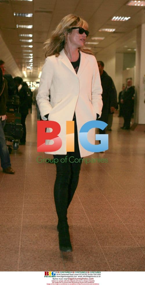 Kate Moss Arrives at Heathrow