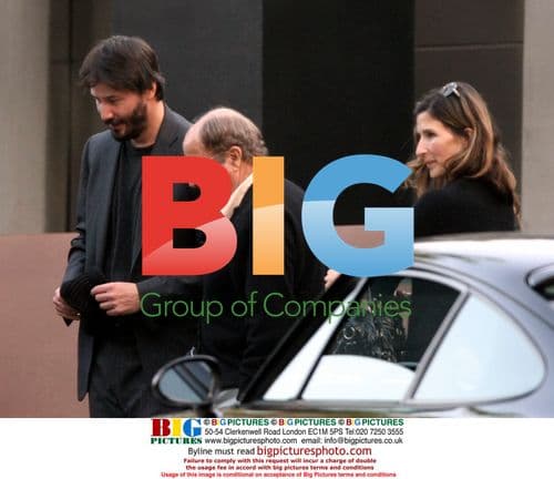 Keanu Reeves Greets Family Outside Home