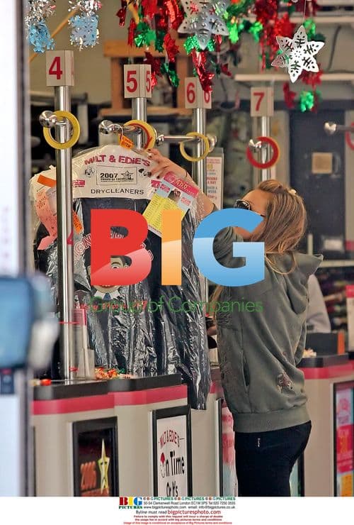 Hilary Duff picks up dry-cleaning