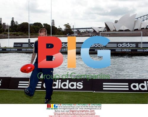 David Beckham Kicks Aussie and Soccer Balls