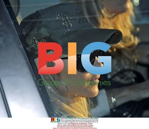 Lindsay Lohan and boyfriend depart JFK Airport