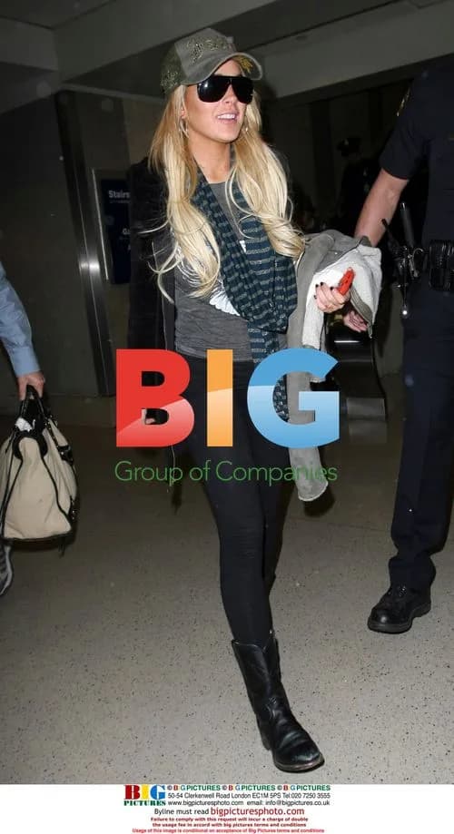 Lindsay Lohan and Riley arrive at LAX