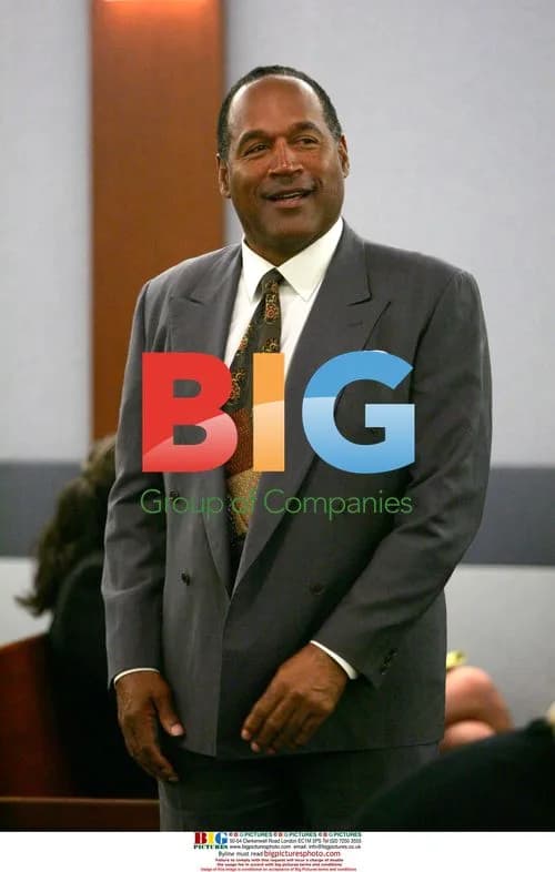 O.J. Simpson smiles in court before Las Vegas arraignment