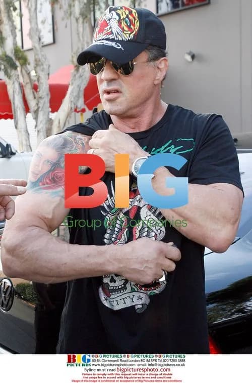Sylvester Stallone Visits Christian Audigier Warehouse