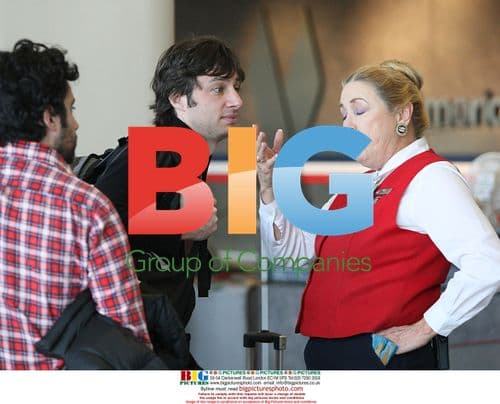 Zach Braff Guided by Airport Staff