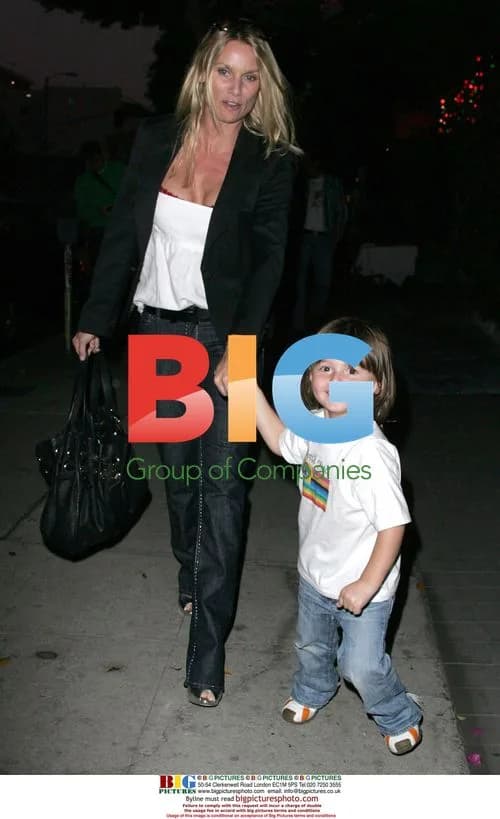 Nicollette Sheridan with young boy in LA
