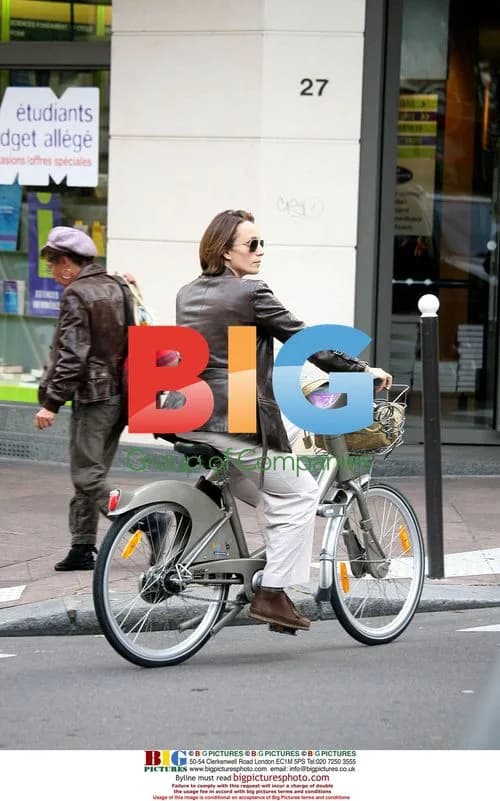Kristin Scott Thomas on Velib bike in Paris