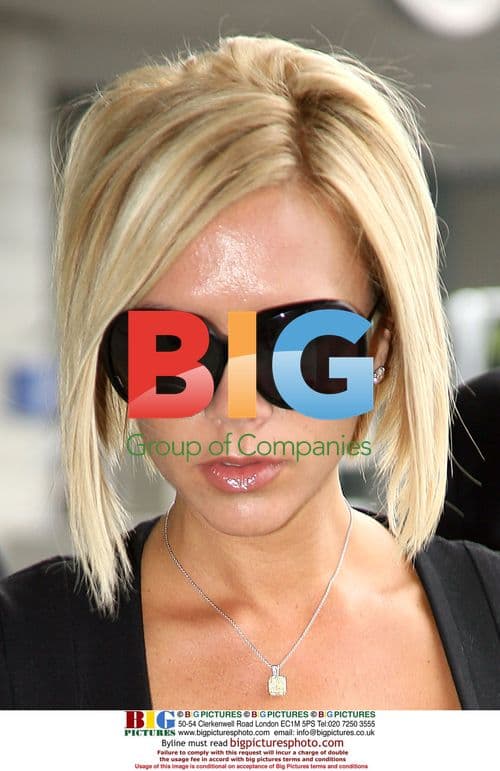 Victoria Beckham and Son at Paris Airport