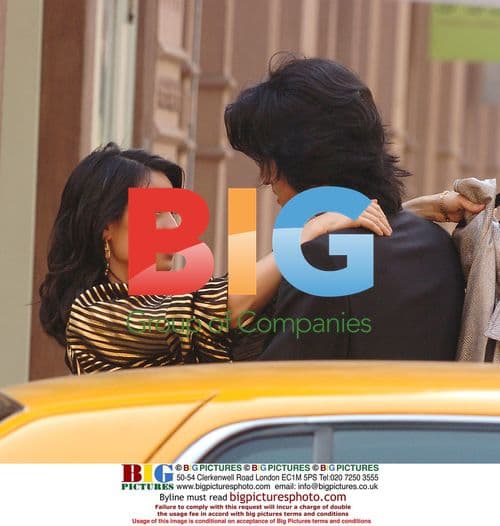 Jack Yang and Lucy Liu on 'Cashmere Mafia' set