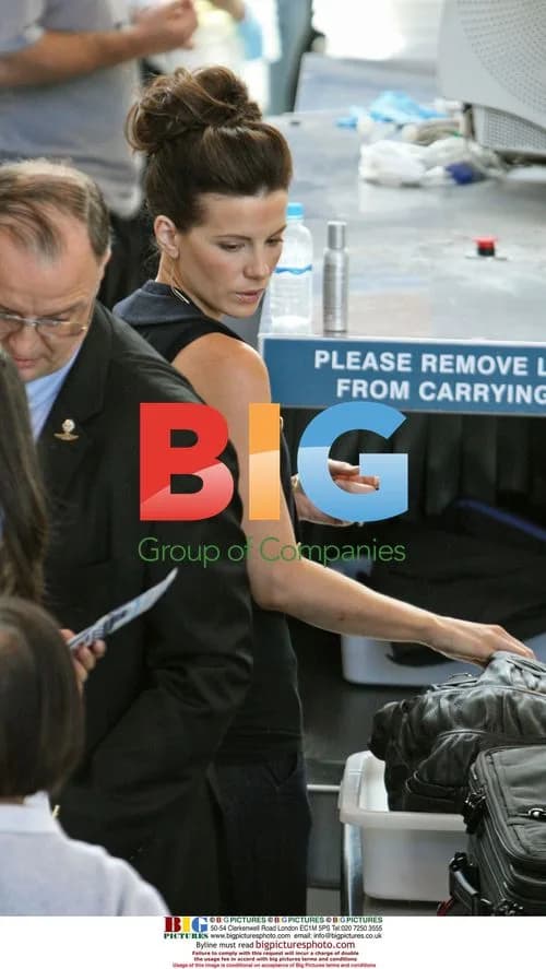 Kate Beckinsale Checked by Airport Security