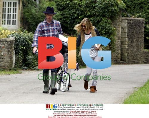 Kate Moss Visits Neighbor in the Cotswolds
