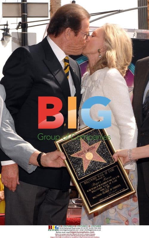 Roger Moore and Christina Tholstrup at Walk of Fame Ceremony
