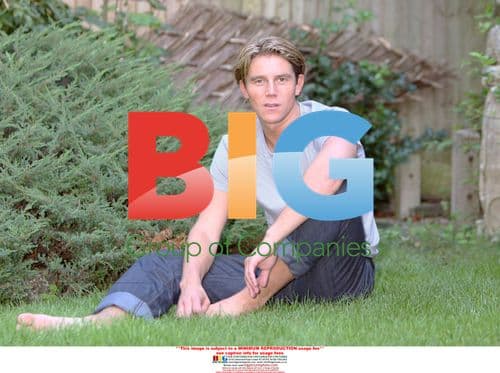 Ziggy Relaxes by the Pool