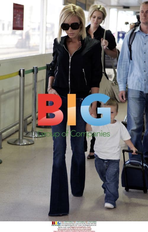 Victoria Beckham and son Cruz at Heathrow