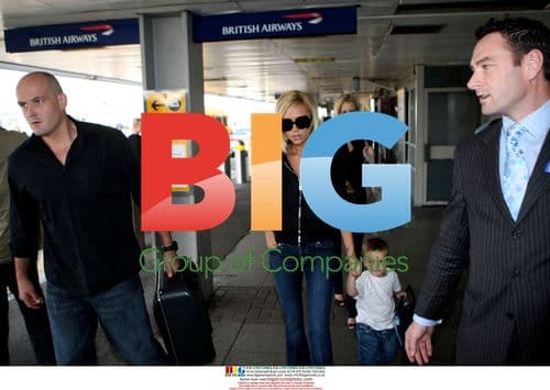 Victoria Beckham and Son Cruz at Airport