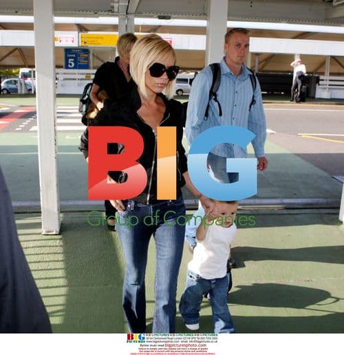 Victoria Beckham and Son at Heathrow