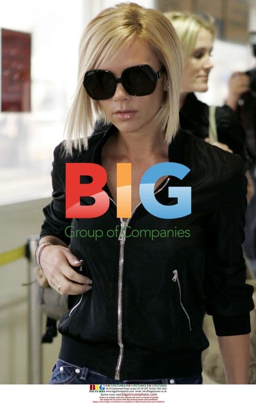 Victoria Beckham and Son at Heathrow