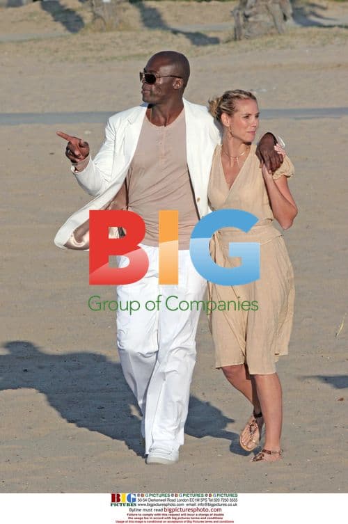 Heidi Klum and Seal frolic and film on the beach