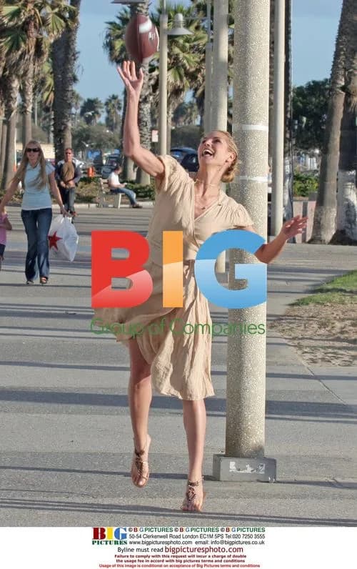Heidi Klum and Seal Frolic on Beach