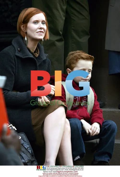 Cynthia Nixon gets kiss from 'Sex and the City' director