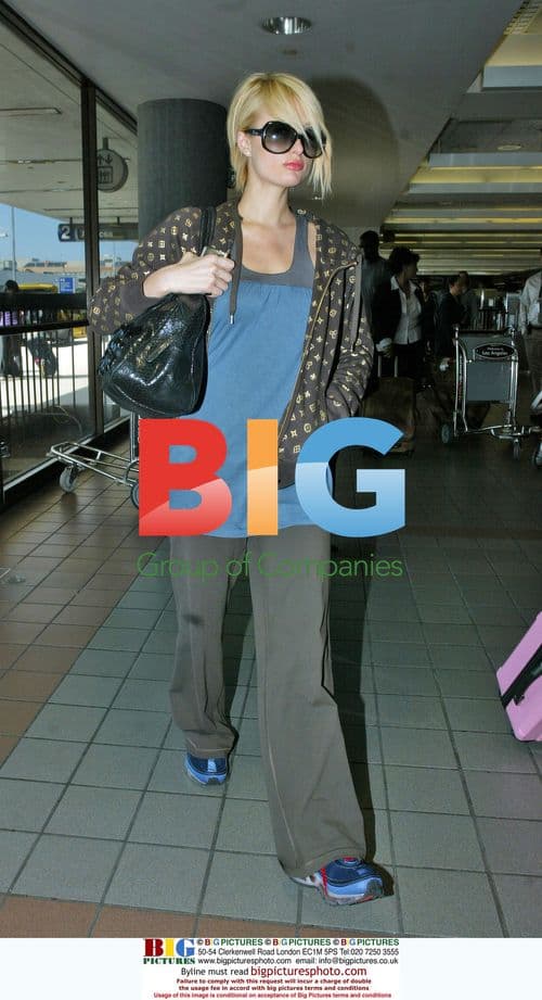 Paris Hilton Departs LAX