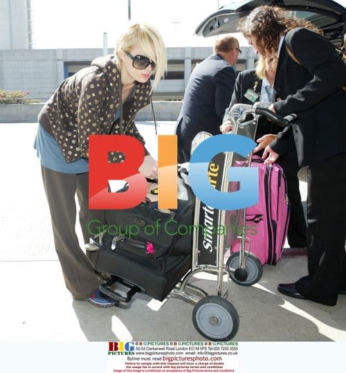 Paris Hilton Departs LAX