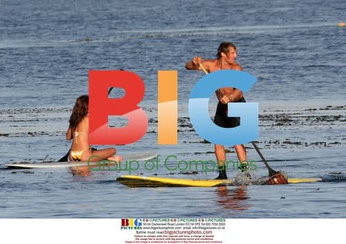 Matthew McConaughey and Camilla Alves Paddle Boarding