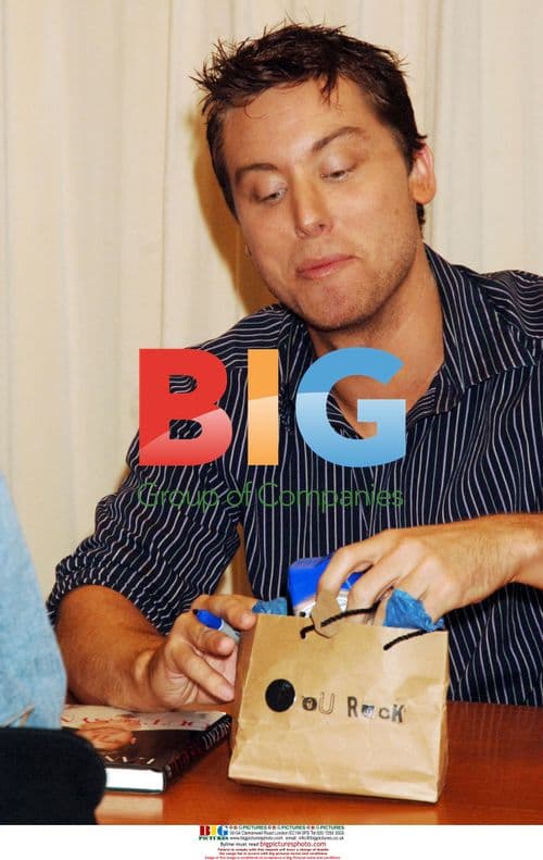 Lance Bass Reacts to Fan Gift at Book Signing