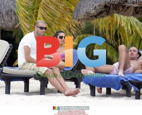 Former French Football Players Relaxing on Mauritius Beach