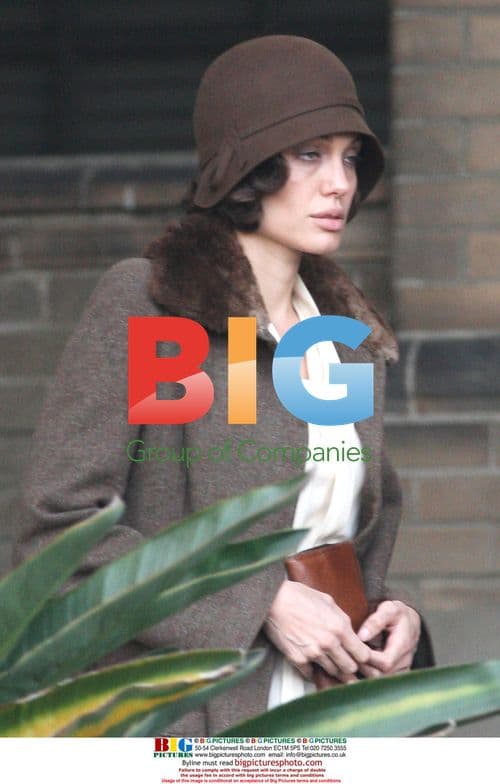 Angelina Jolie and Clint Eastwood on the set of The Changeling