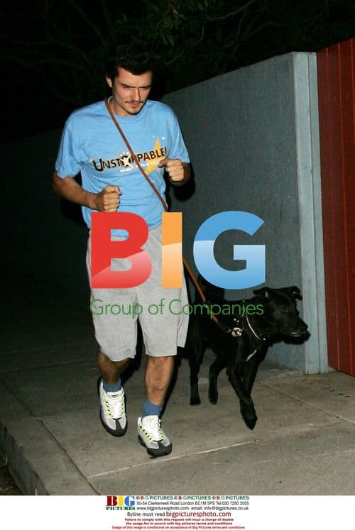 Orlando Bloom Jogs with Dog