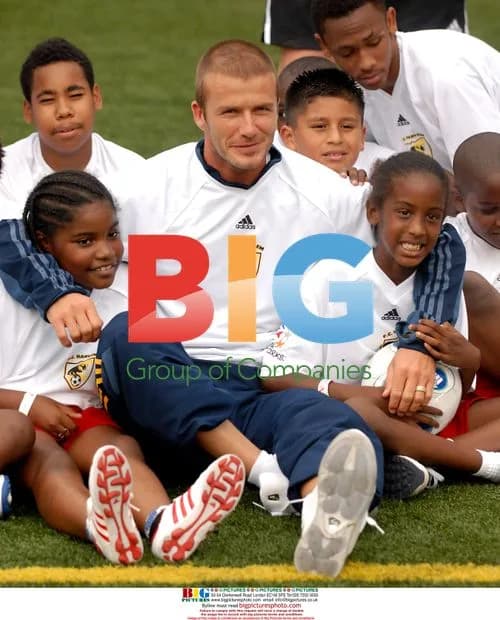 David Beckham Holds Soccer Clinic in Harlem