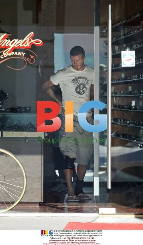 David Beckham and son Brooklyn shopping