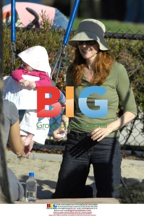 Marcia Cross Plays with Twins in Park