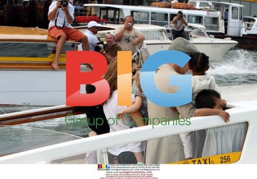 Brad Pitt and Angelina Jolie with Kids Leaving Hotel