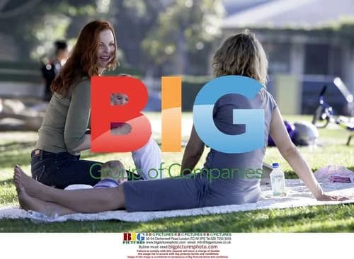 Marcia Cross Picnics with Twins in Park