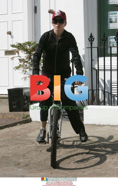 Madonna Leaves Gym on Bike in London