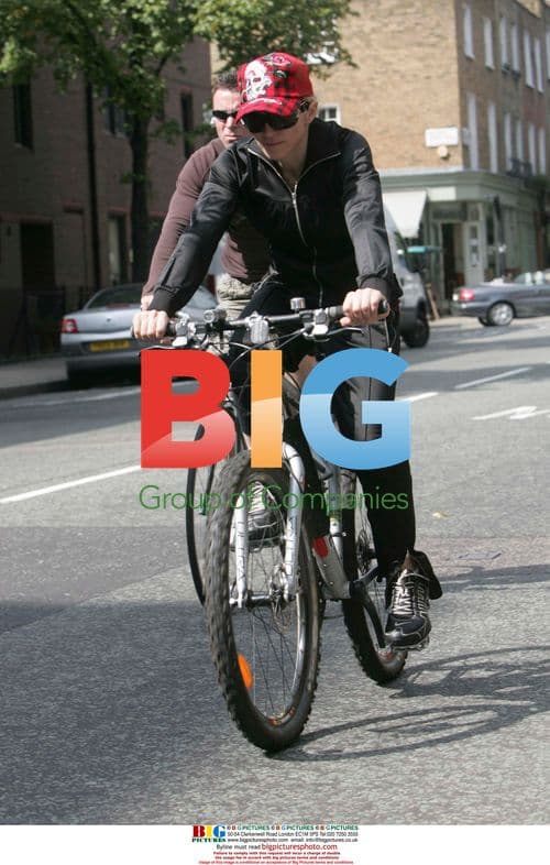 Madonna Leaves Gym on Bike