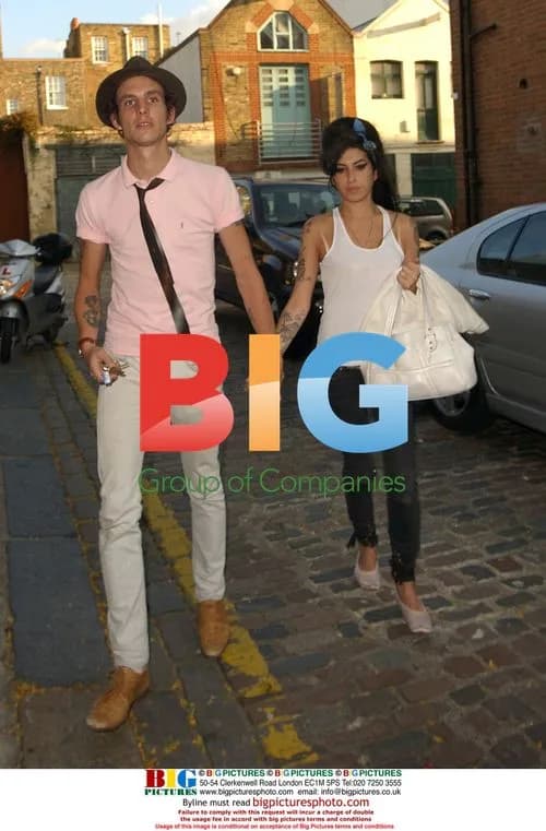 Amy Winehouse and Blake Civil Arrive Home