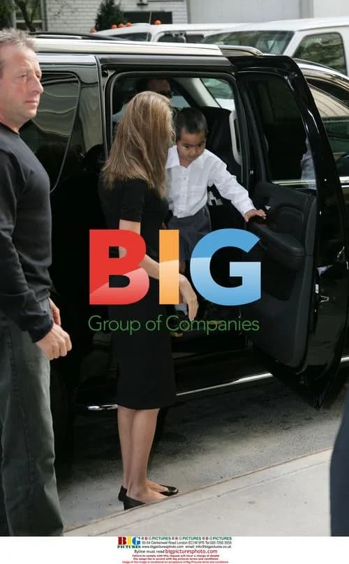 Angelina Jolie Takes Maddox to School